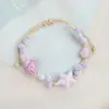 Jingdezhen Navidad Pulsera de Cuerda Trenzada de Cerámica Pulsera de Trébol de Cuatro Hojas Joyería Artística Hecha a Mano Venta al por Mayor Pulseras de Cerámica para Atracciones Turísticas