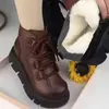 Botas de neve femininas de couro macio, novo estilo de inverno 2026, forradas com fleece para aquecimento, solado grosso, antiderrapantes, cabedal de couro, botas de algodão impermeáveis para mulheres