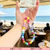 Cadena para teléfono de cuentas color dopamina con lazo en forma de corazón, llavero, colgante para bolso, correa para cámara CCD