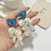 Brincos Românticos Franceses Coloridos com Coração, Flor e Franja Doce Estilo Fada Design de Nicho de Alta Qualidade Tendência