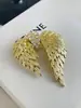 Europeu e Americano novo retro Vintage asas strass elegante terno casaco broche nicho design sentido corpete moda