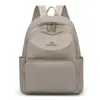 Mochila sencilla para mujer, nuevo estilo 2026, mochila de viaje para mujer, tela Oxford de nailon, bolsa de viaje versátil, bolsa pequeña para libros