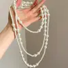 Collar Redondo Multicapa de Perlas y Cuentas Moda Temperamento Cadena para Suéter Elegante Lujo Ligero Sensación de Alta Gama Adorno de Collar Transfronterizo Europeo y Americano