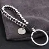 Al por Mayor Punto Creativo Cuerda de Cuero Trenzada Círculo Único Llavero Muñeca Bola de Pelo Llavero Accesorios para Llaves Joyería