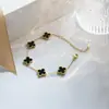 Set de trébol de cuatro hojas de acero de titanio de doble cara transfronterizo de Amazon: pulsera, collar, pendientes, anillo, juego de cuatro piezas, joyería que no se decolora