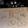 Exquisitos pendientes largos cortos con borlas incrustados de perlas y diamantes para mujer diseño de nicho de lujo ligero pendientes de lazo amor