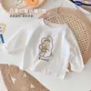Camiseta interior de manga larga para niños otoño e invierno 2023 nuevo estilo coreano holgada blanca cuello redondo top pullover 0183A028