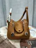 Bolsas de medicina al por mayor bolsas para mujer cuero de capa superior con textura de lichi bolsa de enfermera hombro portátil bolsa Lindi bolsa almohada Europa y Estados Unidos