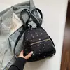 Mochila con Patrón de Estrellas para Estudiante Femenina Bolsa Escolar 2026 Linda Estilo Coreano Mochila para Viaje Simple Versátil Mini Mochila