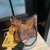 Bolso de Cuero Aceite-Cera Texturizado para la Axila para Mujer 2026 Nuevo Estilo de Moda Versátil Bolso de Hombro Cruzado Bolso Tote de Gran Capacidad