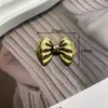 Accesorios Cuadrados a Cuadros de Aleación Xiangfeng Corazón de Durazno Lazo Temperamento Joyería Bronce Ropa Accesorios para el Cabello Material