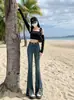 Jeans de Pierna de Trompeta Dividida Color Óxido de Cintura Alta con Sentido del Diseño para Mujer, Verano Nuevo, Ajustados, Retro, Elásticos, Modernos