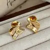 Pendientes Metálicos Irregulares Estilo Europeo y Americano para Mujer, Pendientes Minimalistas de Lujo Ligero de Nicho Espiral Tridimensional de Gama Alta