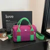 2026 Nueva Moda Bolso de Hombro Único Estilo Coreano para Mujer Alta Apariencia Bolso de Mano Tipo Almohada Casual Ligero para Viaje Bolso Cruzado