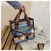 Bolso de Mujer Estilo Étnico Nuevo 2026, Bolso de Hombro Tejido de Moda, Bolso Cruzado Tipo Cubo Tendencia, Bolso de Mujer de Nicho al por Mayor