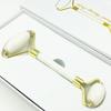 Suministro directo de fábrica Jade Rodillo masajeador facial Blanco verde Jia Cui doble cabeza recipiente de belleza Xiuyu caja de regalo