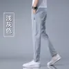 Comércio exterior fábrica original verão ultra-fino secagem rápida casual calça comprida masculina elástica calça esportiva calça de seda gelada slim fit