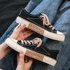 Fubu 2026 Primavera Nuevo Estilo Zapatos Galleta Zapatos de Lona para Mujer Caña Baja Estilo Coreano Zapatos de Moda Muy Populares en Instagram Zapatos para Mujer Zapatos de Estudiante