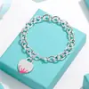 Pulsera para Pareja Etiqueta Inglesa en Forma de Corazón Marca T Cierre de Amor Ot Esmalte Azul Anillo de Corazón Melocotón Joyería Estilo Ins Transfronterizo
