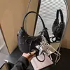Bolsa Transfronteriza 2026 Nueva Dulce y Linda para Mujer con Lazo, Bolso Cruzado Pequeño, Estilo de Nicho, Bolso Tipo Dumpling de Gama Alta, Bolso de Hombro