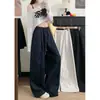 Foto real de los nuevos pantalones casuales de diseño otoño 2026 con cordón y cintura elástica, pantalones anchos holgados y versátiles para mujer