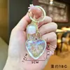 Llavero Creativo de Color UV Galvanizado Corazón de Amor Moderno y Tendencia Colgante Pequeño para Bolso Exquisito Lindo Regalo para Pareja Venta al por Mayor