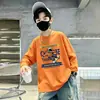 Camiseta de manga comprida de outono para meninos, novo modelo primavera e outono 2026, base de algodão puro, blusa infantil grande, moderna