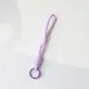 Estilo ins correa de muñeca para teléfono accesorio de juguete taza de teléfono tejida ventilador de mano tejido nudo fuerte