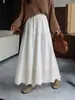 Nuevo estilo de otoño falda larga con dobladillo grande diseño hueco estampado bordado con cintura elástica, falda versátil de línea A