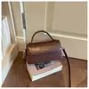 Bolsa de mão quadrada pequena de nicho da moda transfronteiriça para mulheres, nova bolsa de ombro e transversal vintage com padrão trançado para o dia a dia, de alto valor