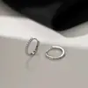 Pendientes de botón minimalistas de alta gama con circonita para mujer con un diseño de círculo creativo