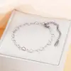 Novo design transfronteiriço em aço inoxidável, pulseira ajustável simples em fio plano em forma de coração, joia versátil em aço titânio banhado a vácuo em ouro 18K