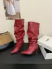 []Botas de Cano Alto Dobradas com Salto Alto de Circunferência Grande Outono/Inverno 2026 Botas Longas Europeias e Americanas para Mulheres Botas de Salto Alto Apontadas Acima do Joelho