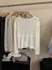Suéter de Punto Suave Color Sólido Hueco Botón Lateral Cuello Redondo Estilo Coreano para Mujer, Nuevo Casual Holgado Manga Larga Otoño 2026