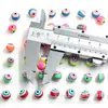 Cuentas de ojo de colores transfronterizas arcilla blanda perforadas redondas cuentas diy pulsera hecha a mano para niños collar cuentas sueltas material venta al por mayor