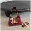 Bolsa feminina fashion com corrente de couro encerado a óleo transversal 2026 nova bolsa tote retrô de temperamento grande capacidade para o dia a dia bolsa de ombro único