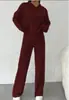 Nuevo estilo de comercio exterior 2026, conjunto de punto a rayas holgado con capucha, ropa casual de manga larga, estilo europeo y americano, venta al por mayor de ropa para mujer