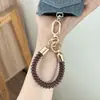 Cordón retráctil de silicona para teléfono, llavero corto de bobina para teléfono, cadena para teléfono, correa de muñeca, sensación de alta gama