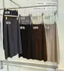 Falda midi de punto negra estilo europeo y americano, colección otoño/invierno 2026, cintura elástica con cordón, abertura trasera, corte recto, talla única