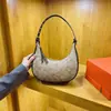 Bolso de mujer de alta gama 2026 nuevo de moda influencer bolso de axila bolso con estampado retro bolso de hombro versátil de nicho