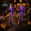 Luces de cadena de Halloween transfronterizas, luces de suelo de calavera, luces decorativas de ambiente para patio exterior y césped alimentadas por energía solar, esqueleto simulado