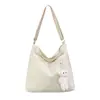 2021 Otoño Nuevo Bolso de Lona Color Sólido Estilo Escolar Bolso de Tela Cruzado de Hombro para Niña Japonés y Coreano Bolso de Tela de Gran Capacidad