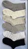 Calcetines de algodón puro para mujer, otoño e invierno, con bordes de volantes y lunares, longitud hasta la pantorrilla, estilo coreano, versátiles y modernos, hechos con algodón de Xinjiang, diseño sin costuras y un dobladillo con volantes.