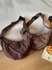 Bolso vintage de nicho con estampado de leopardo para otoño e invierno para mujer 2025 nuevo casual versátil marrón moderno para el trabajo bandolera tipo albóndiga