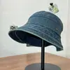 Chapéu de pescador de brim largo estilo coreano para primavera/verão, proteção solar para o rosto, design de nicho ins, jeans lavado para mulheres com elástico atrás, moderno e estiloso