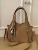 Bolsa de Mão Versátil Nova Outono e Inverno 2025 Bolsa de Ombro Feminina Bolsa Tote de Grande Capacidade para o Dia a Dia Bolsa Transversal Bolsa de Viagem