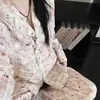 Pijama moderno de estilo minimalista con estampado de estrellas, nuevo conjunto de primavera/otoño de manga larga y pantalón largo, ropa de casa de alta apariencia para niñas