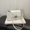 Bolsa de axila nicho estilo francês para mulheres, nova moda outono 2026, bolsa quadrada pequena versátil, bolsa transversal casual para o dia a dia