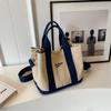 Bolsa de lona para cesta de verduras de color contrastante con bordado de letras casuales europeas y americanas, nueva bolsa de hombro portátil con textura retro 2023