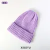 Sombrero de punto nuevo de rayas verticales con punta transfronterizo otoño e invierno cálido unisex versátil de dopamina color sólido sombrero de pareja